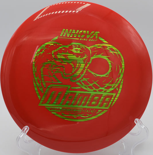 A disc golfer executing a full-power roller with a Star Mamba at Rotary Disc Golf Course in Huntington, West Virginia.