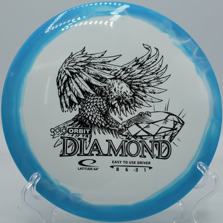 Latitude 64 Diamond with sky blue rim spinning across open terrain at Veterans Park in Arlington, Texas


