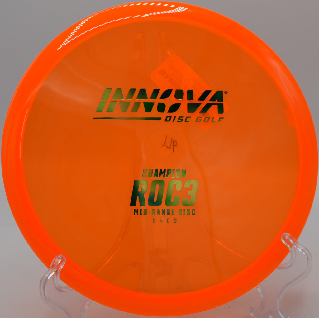An Innova Champion Roc3 flying down the open fairway at DeLaveaga Disc Golf Course in Santa Cruz, California, showing its consistent fade.