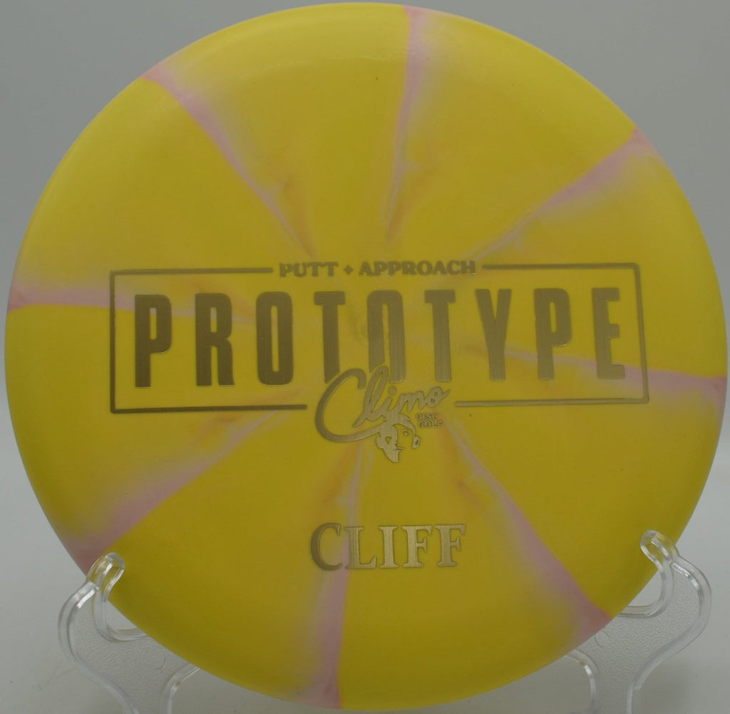 Climo Discs Cliff beadless putter parked near basket at Camden II Disc Golf Course in Milan, Illinois