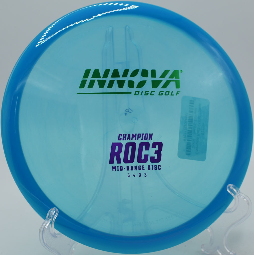 A disc golfer relying on the stability of a Champion Roc3 for a windy upshot at The Fort Disc Golf Course in Ogden, Utah.
