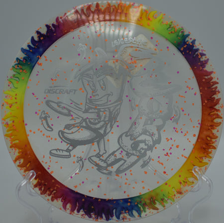 Tie-Dye Fuzed Scorch hyzer-flip drive gliding downhill at Maple Hill Disc Golf Course, Leicester MA