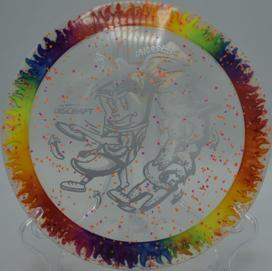 Tie-Dye Fuzed Scorch hyzer-flip drive gliding downhill at Maple Hill Disc Golf Course, Leicester MA