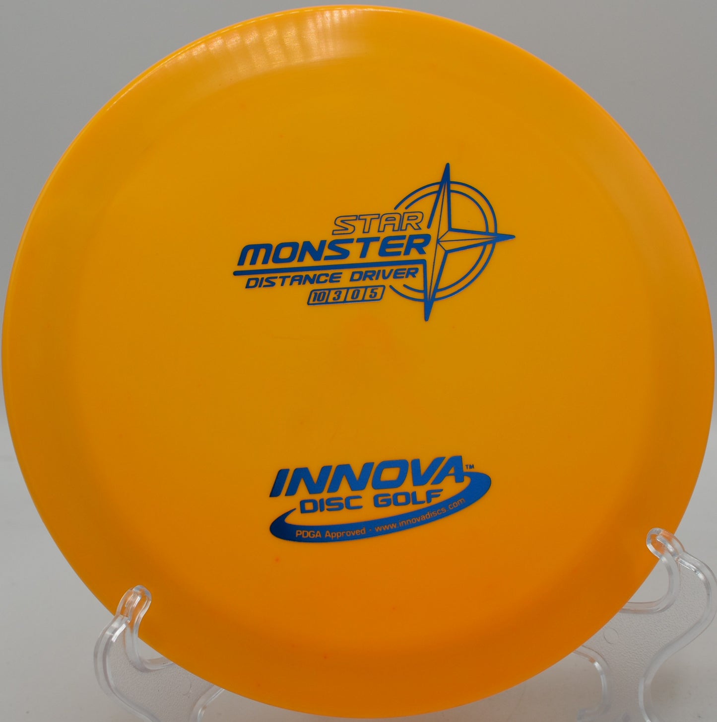 Innova Star Monster holding a tight flex line through the woods at Idlewild Disc Golf Course in Burlington, Kentucky.


