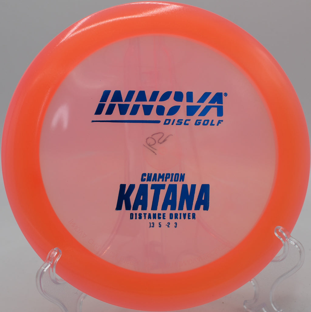An Innova Champion Katana flying over the water carry on hole 16 at Moraine State Park Disc Golf Course in Portersville, Pennsylvania, gliding toward the basket.