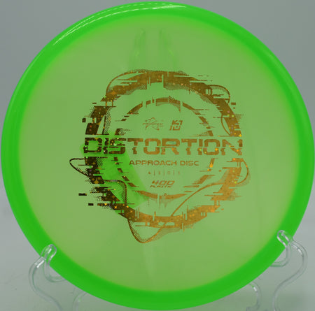 Overstable Prodigy Distortion flexing back hard on a wooded fairway at Maple Hill in Leicester, Massachusetts