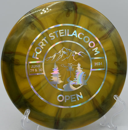 Nebula Ethereal Omen ripping through a power hyzer at Maple Hill Disc Golf Course in Leicester, Massachusetts, delivering sharp fade and dependable overstability.

