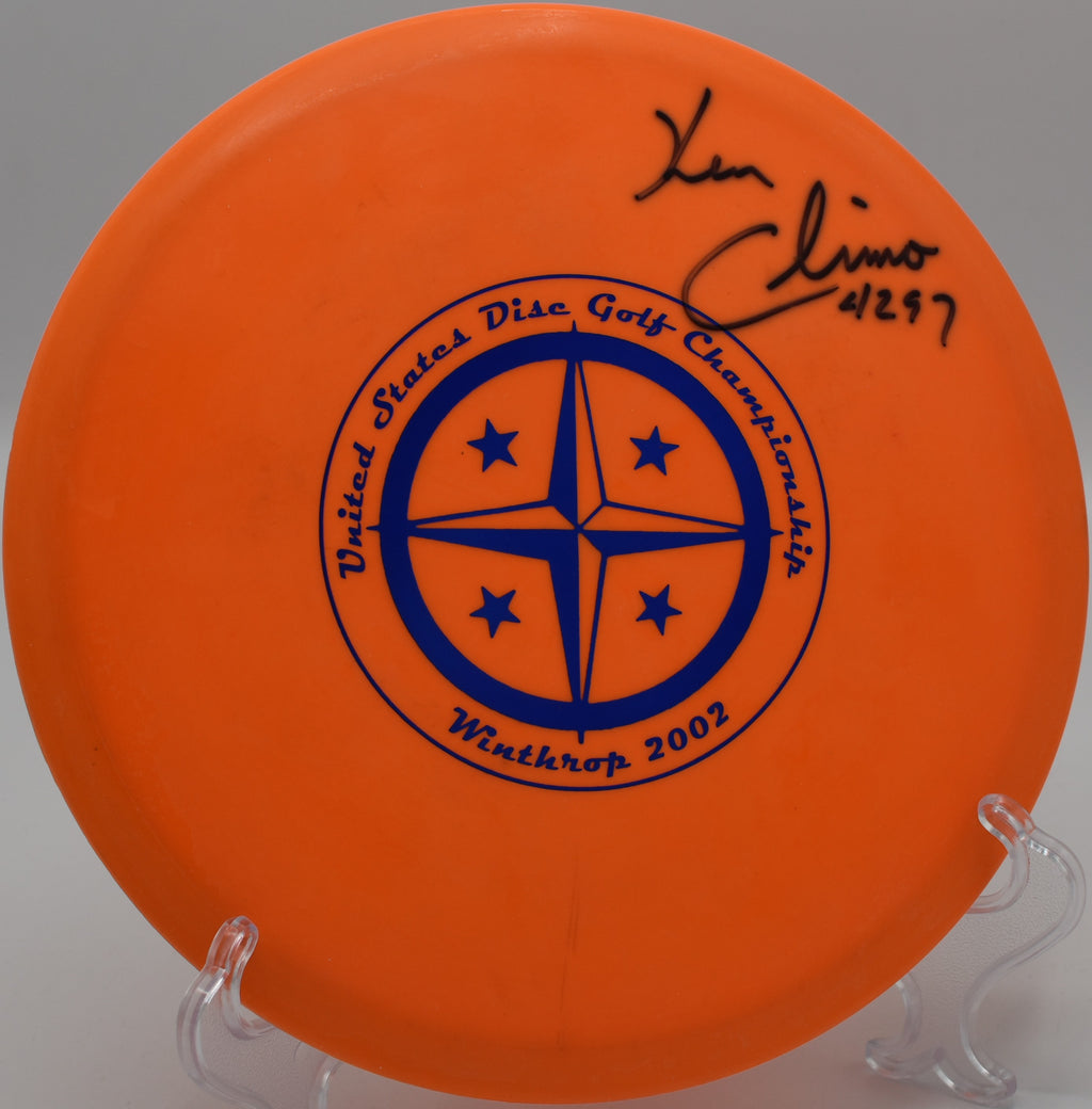 Champion Edition Roc gliding with precision over wooded fairways at Maple Hill Disc Golf Course, Massachusetts.