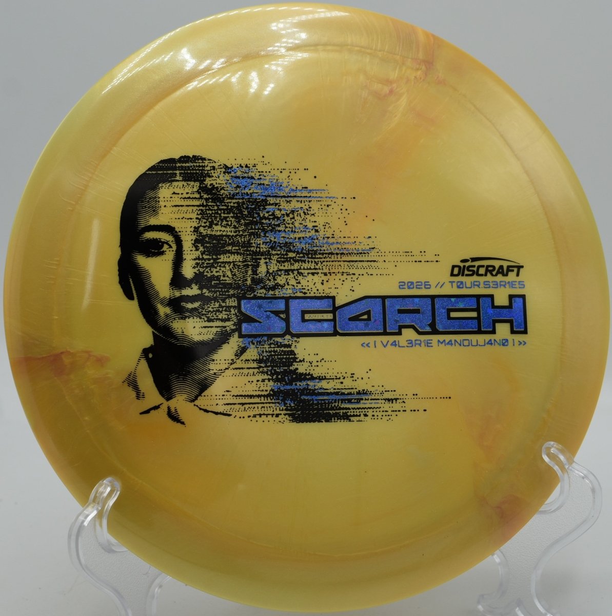 Discraft Tour Series Scorch high glide driver turning over fairway at DeLaveaga Disc Golf Course in Santa Cruz, California