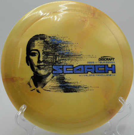 Discraft Tour Series Scorch high glide driver turning over fairway at DeLaveaga Disc Golf Course in Santa Cruz, California