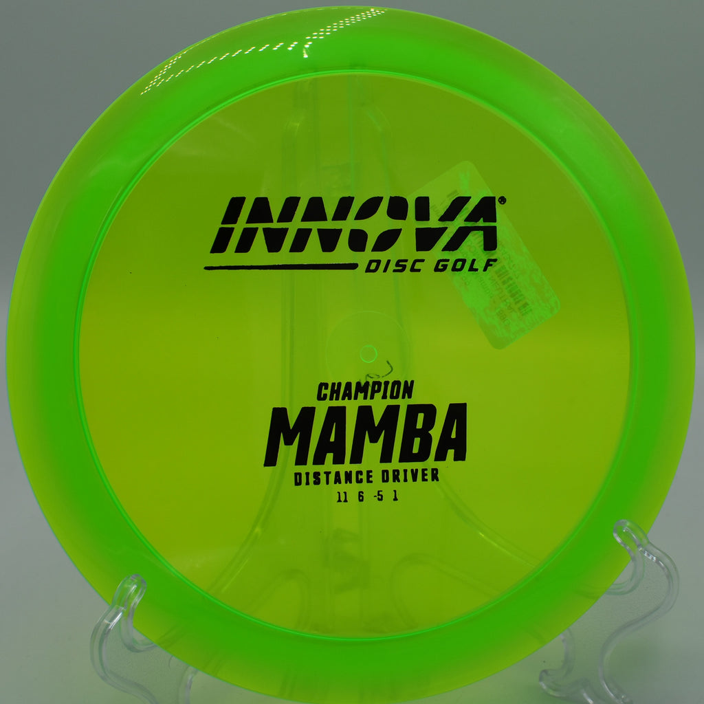 An Innova Champion Mamba smoothly flipping up on a downhill fairway at Trophy Club Disc Golf Course in Trophy Club, Texas.