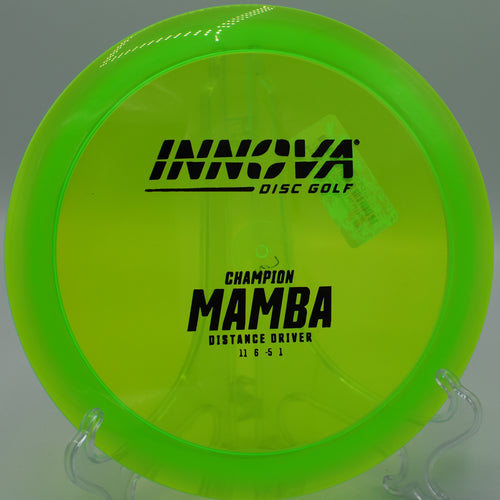 An Innova Champion Mamba smoothly flipping up on a downhill fairway at Trophy Club Disc Golf Course in Trophy Club, Texas.