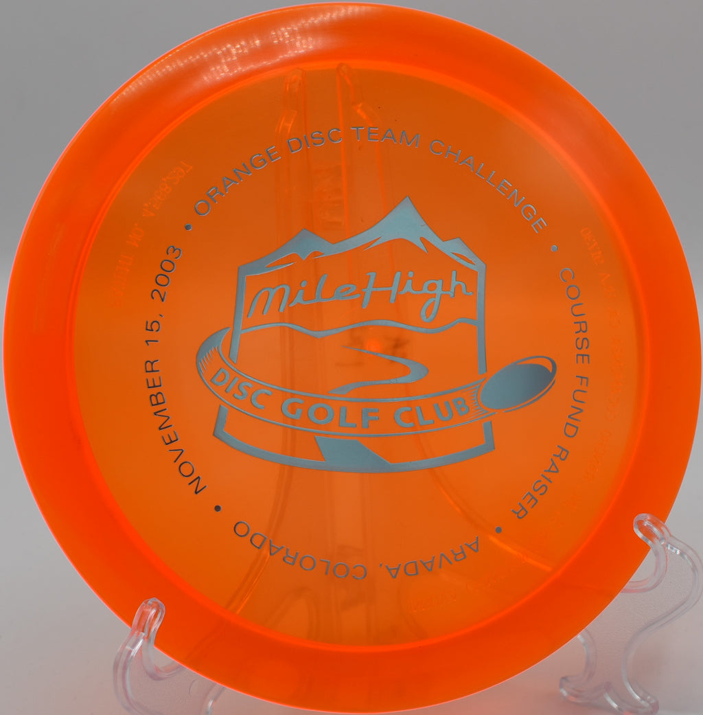Champion Edition Archangel soaring gracefully on a long turnover shot at Harmony Bends Disc Golf Course, Missouri.