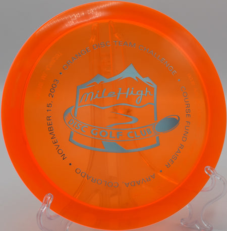 Champion Edition Archangel soaring gracefully on a long turnover shot at Harmony Bends Disc Golf Course, Missouri.