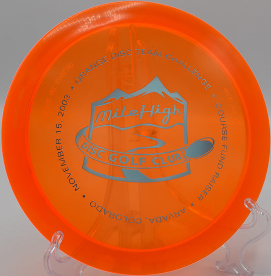 Champion Edition Archangel soaring gracefully on a long turnover shot at Harmony Bends Disc Golf Course, Missouri.