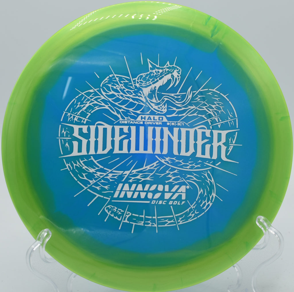 An Innova Halo Star Sidewinder turning effortlessly down a long fairway at Johnny Roberts Disc Golf Course in Arvada, Colorado.