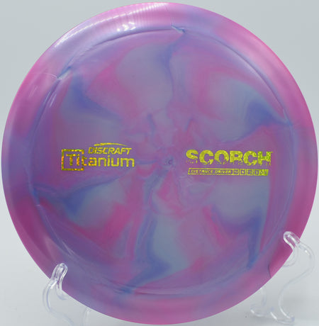 Discraft Titanium Scorch – 11-speed overstable distance driver offering a controlled fade and high-speed flight for powerful drives.