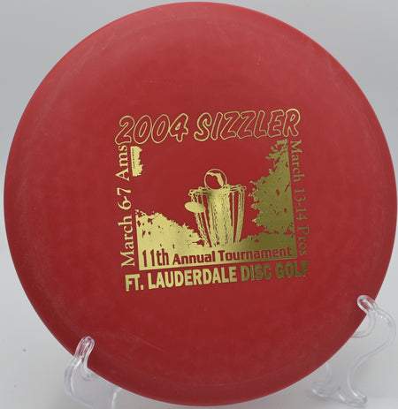 Innova DX Roc slicing through the woods on Hole 3 at Bald Mountain Disc Golf Course, Lake Orion, Michigan.
