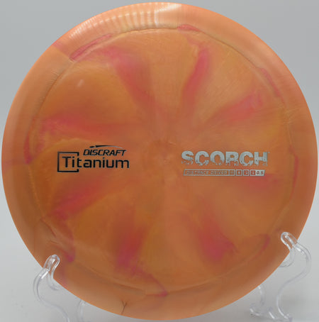 Titanium Scorch by Discraft – Durable, high-speed distance driver designed for reliable distance, flex shots, and controlled finishes.