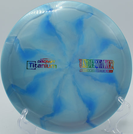 Discraft Titanium Undertaker – High-performance stable distance driver, designed for precise long-distance throws and controlled fade.