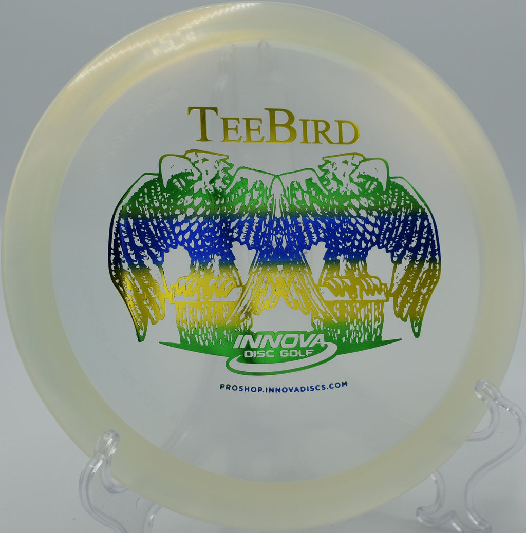 Innova Totem TeeBird gliding through a wooded fairway on Hole 13 at Branson Trails Disc Golf Course, Branson, Missouri.