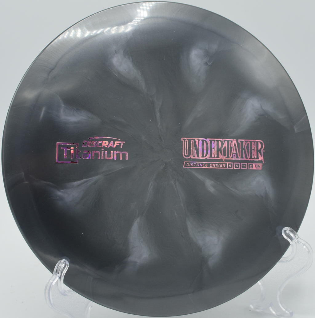 Titanium Undertaker – Overstable driver with a smooth fade, great for forehand throws, flex shots, and controlled long-range placements.