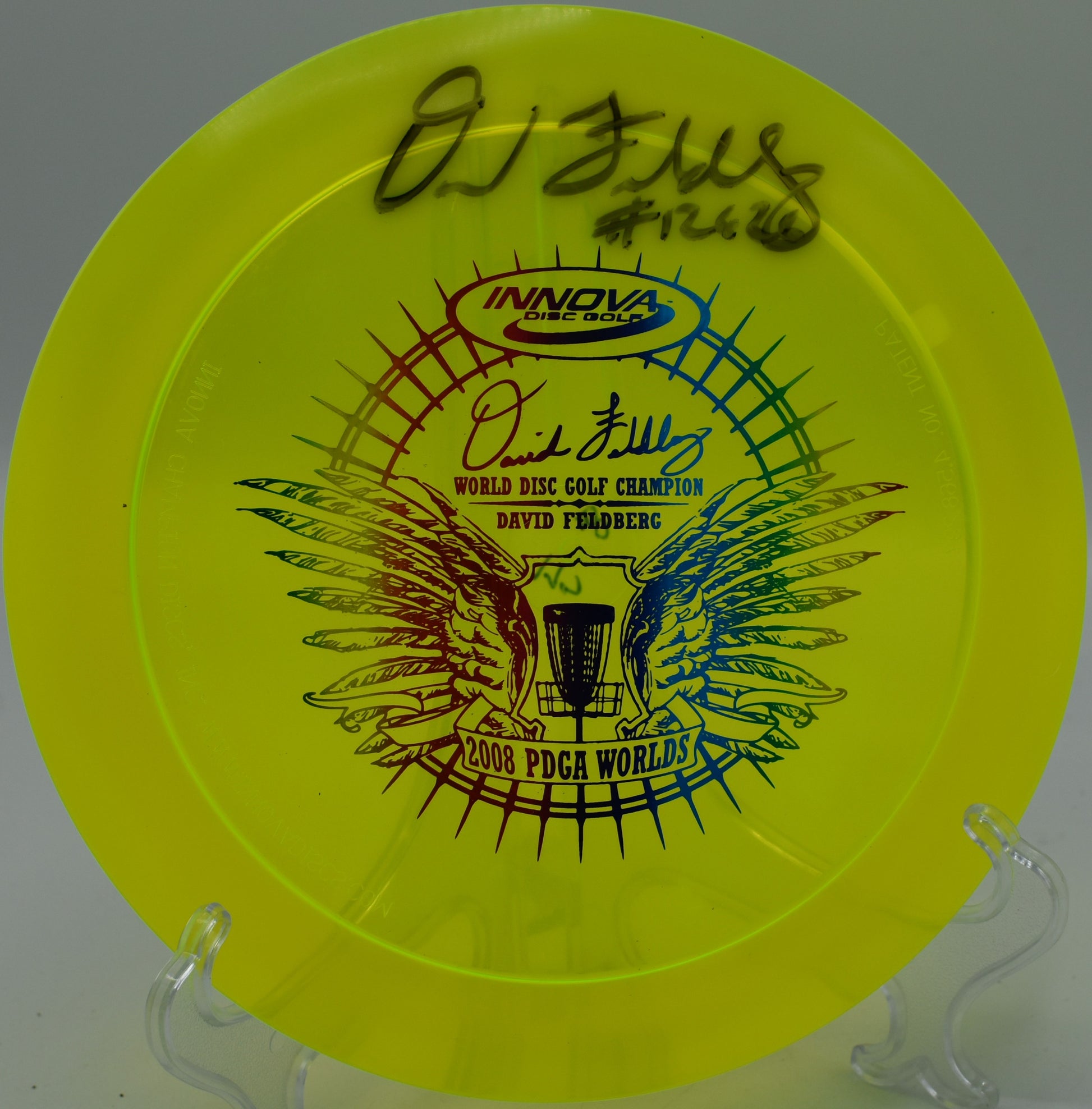 Champion Boss disc flying powerful forehand drives at Harmony Bends Disc Golf Course, Missouri.