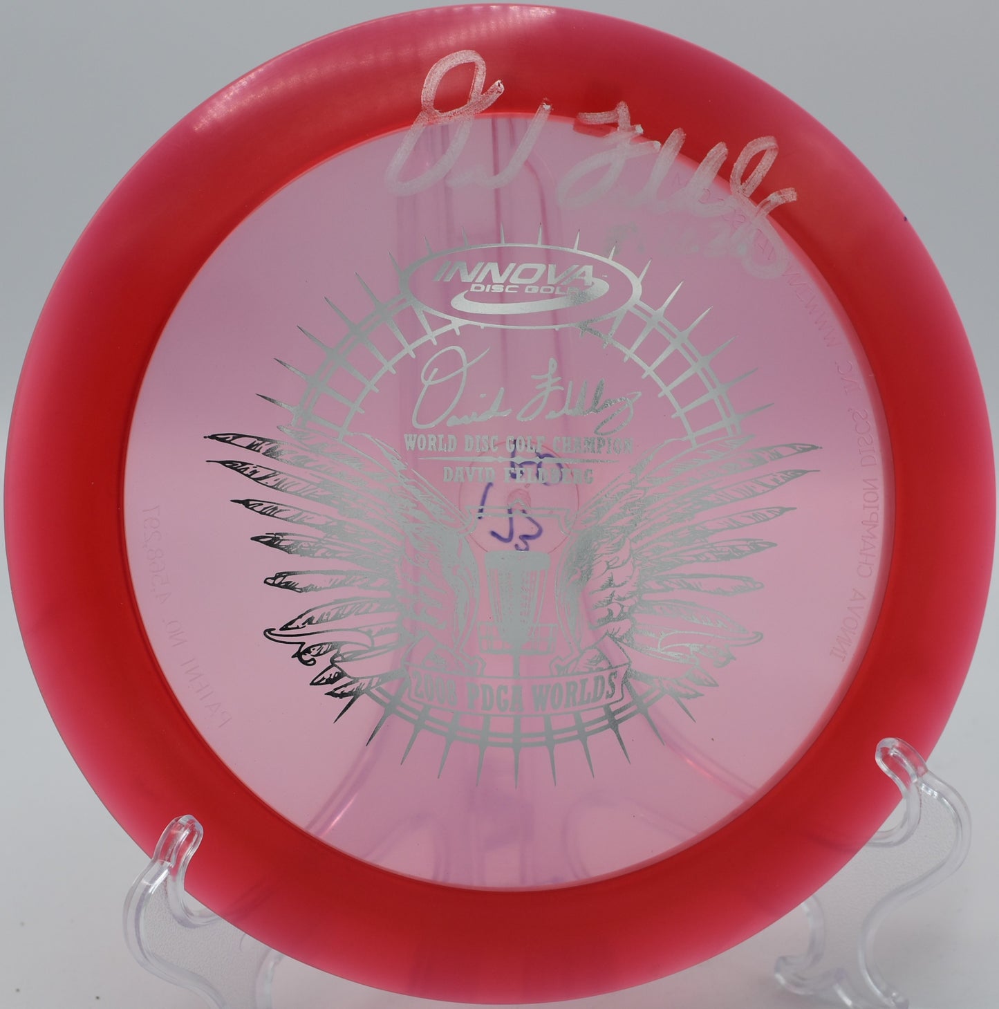 Innova Champion Boss carving hyzer lines on open fairways at Blue Ribbon Pines Disc Golf Course, Minnesota.