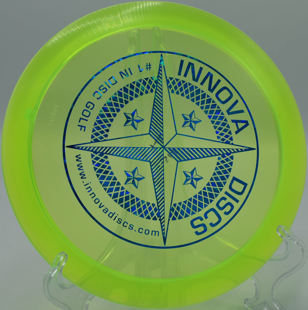 Innova Proto Star Thunderbird fading smoothly toward the basket on Hole 9 at Black Bear Disc Golf Course, Duluth, Minnesota.