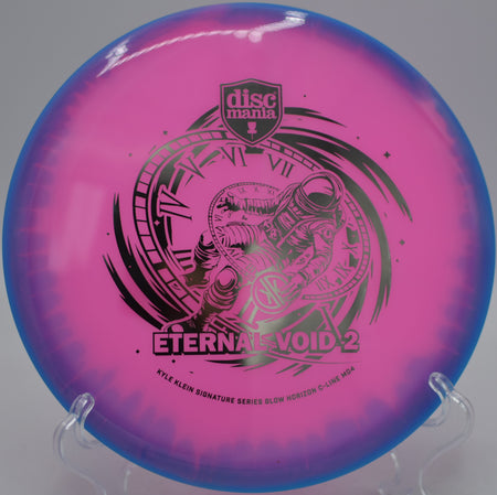 Discmania Eternal Void 2 MD4 glowing midrange gliding straight at Maple Hill Disc Golf Course, Leicester MA