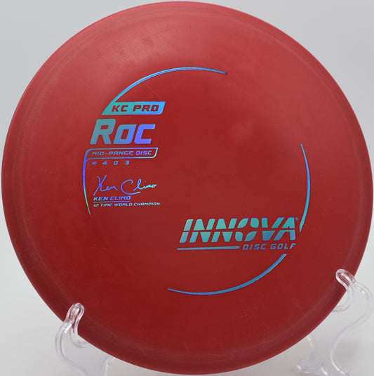 A player relying on the KC Pro Roc for a touchy flex shot at Kincaid Park Disc Golf Course in Anchorage, Alaska.
