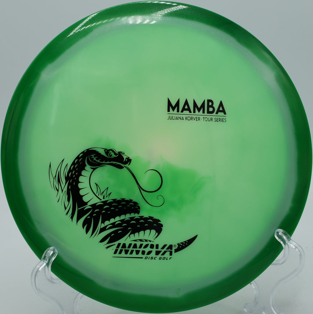 An Innova Halo Star Mamba carrying a smooth turnover down the fairway at Beaver Ranch Disc Golf Course in Conifer, Colorado.