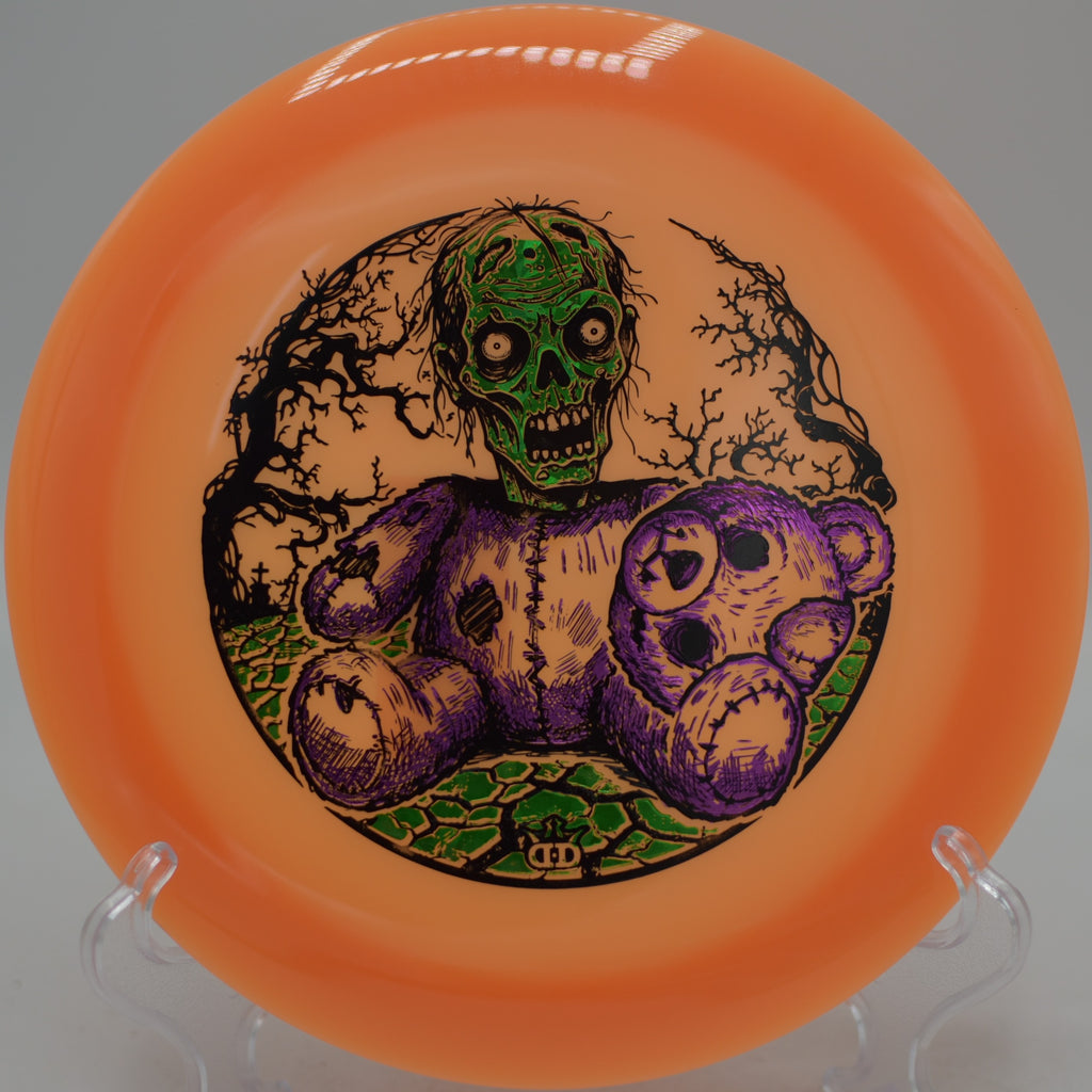 Dynamic Discs Heist glow rim driver streaking through night at Idlewild Disc Golf Course, KY