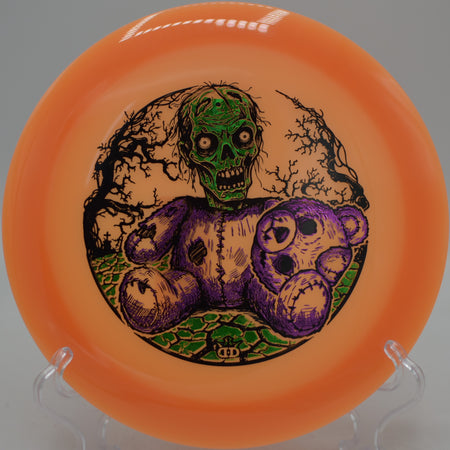 Dynamic Discs Heist glow rim driver streaking through night at Idlewild Disc Golf Course, KY