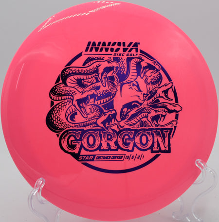 An Innova Star Gorgon landing softly on the fairway at Wildcat Bluff Disc Golf Course in Urbana, Iowa.