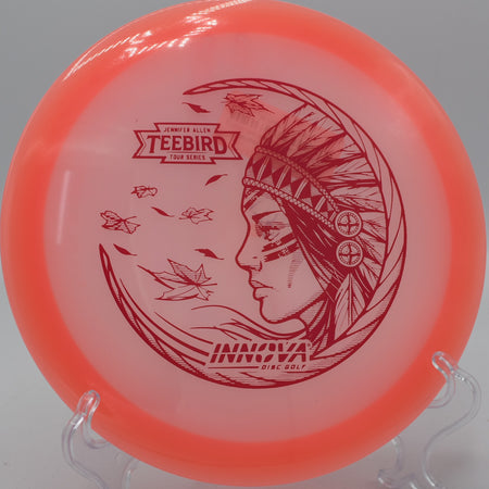 Innova Glow Champion TeeBird gliding through a tight wooded fairway on Hole 8 at Trophy Club Disc Golf Course, Trophy Club, Texas.
