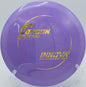 An Innova Pro Gorgon carving a long anhyzer shot at Persimmon Ridge Disc Golf Course in Greenbrier, Arkansas.
