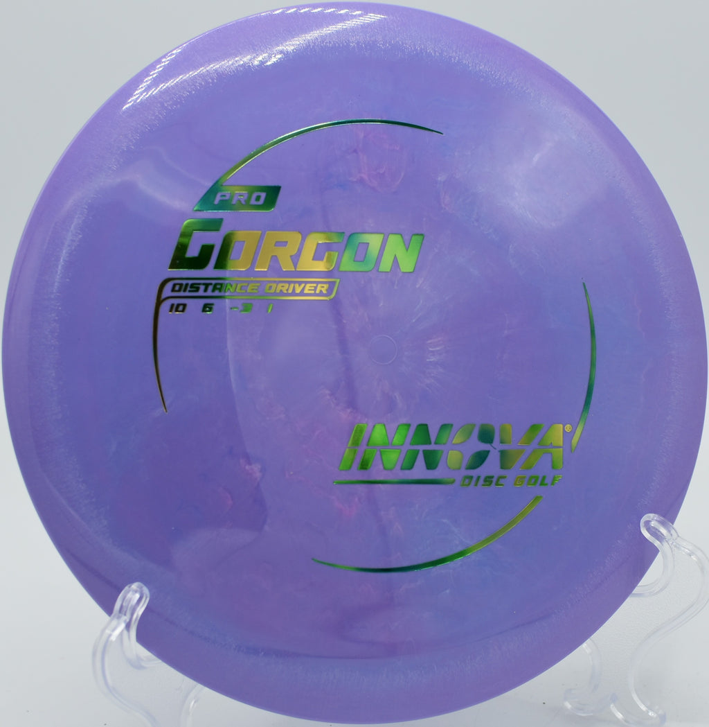 An Innova Pro Gorgon sailing over the rolling hills of Devils Glen Disc Golf Course in Bettendorf, Iowa.