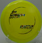 An Innova Pro Gorgon landing near the basket after a controlled shot at Wickham Park Disc Golf Course in Manchester, Connecticut.