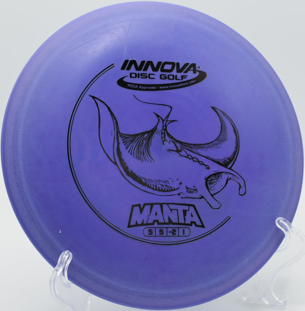 A disc golfer throwing a smooth anhyzer approach with a DX Manta at Foothills Disc Golf Course in Easley, South Carolina.