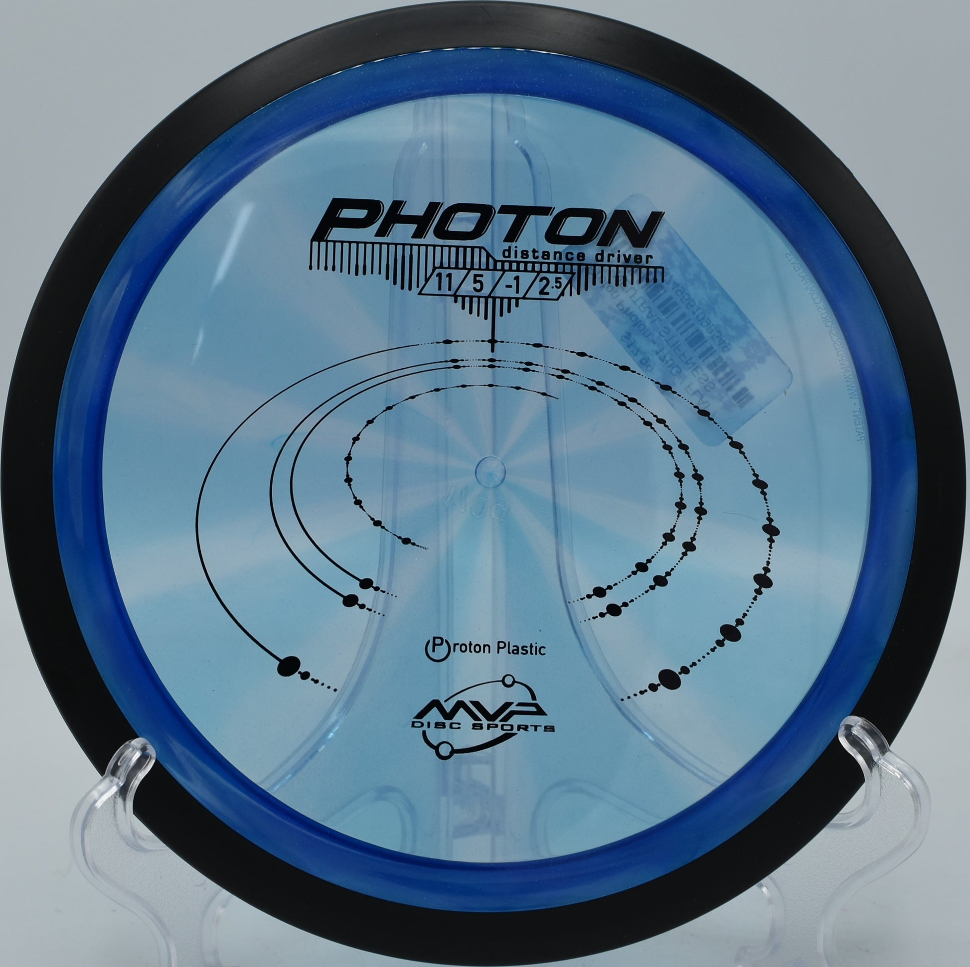 Proton Photon launching over a foggy valley at Camp Sekani Disc Golf Course in Spokane, Washington.


