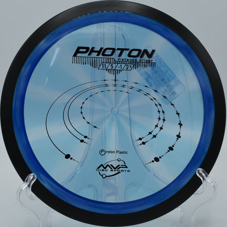 Proton Photon launching over a foggy valley at Camp Sekani Disc Golf Course in Spokane, Washington.

