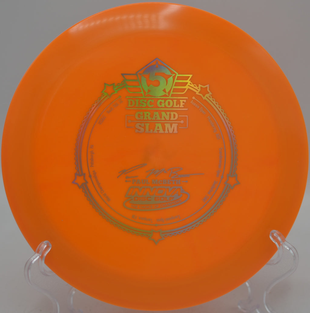 Innova Grand Slam Star Destroyer Paul McBeth commemorative distance driver launching a full-power hyzer bomb at Maple Hill Disc Golf Course in Leicester, Massachusetts.