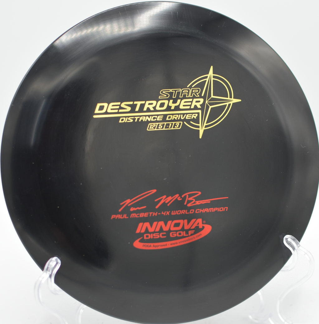Innova Paul McBeth 4X Destroyer penned edition distance driver launching max-distance backhands at Fountain Hills Disc Golf Course in Fountain Hills, Arizona.