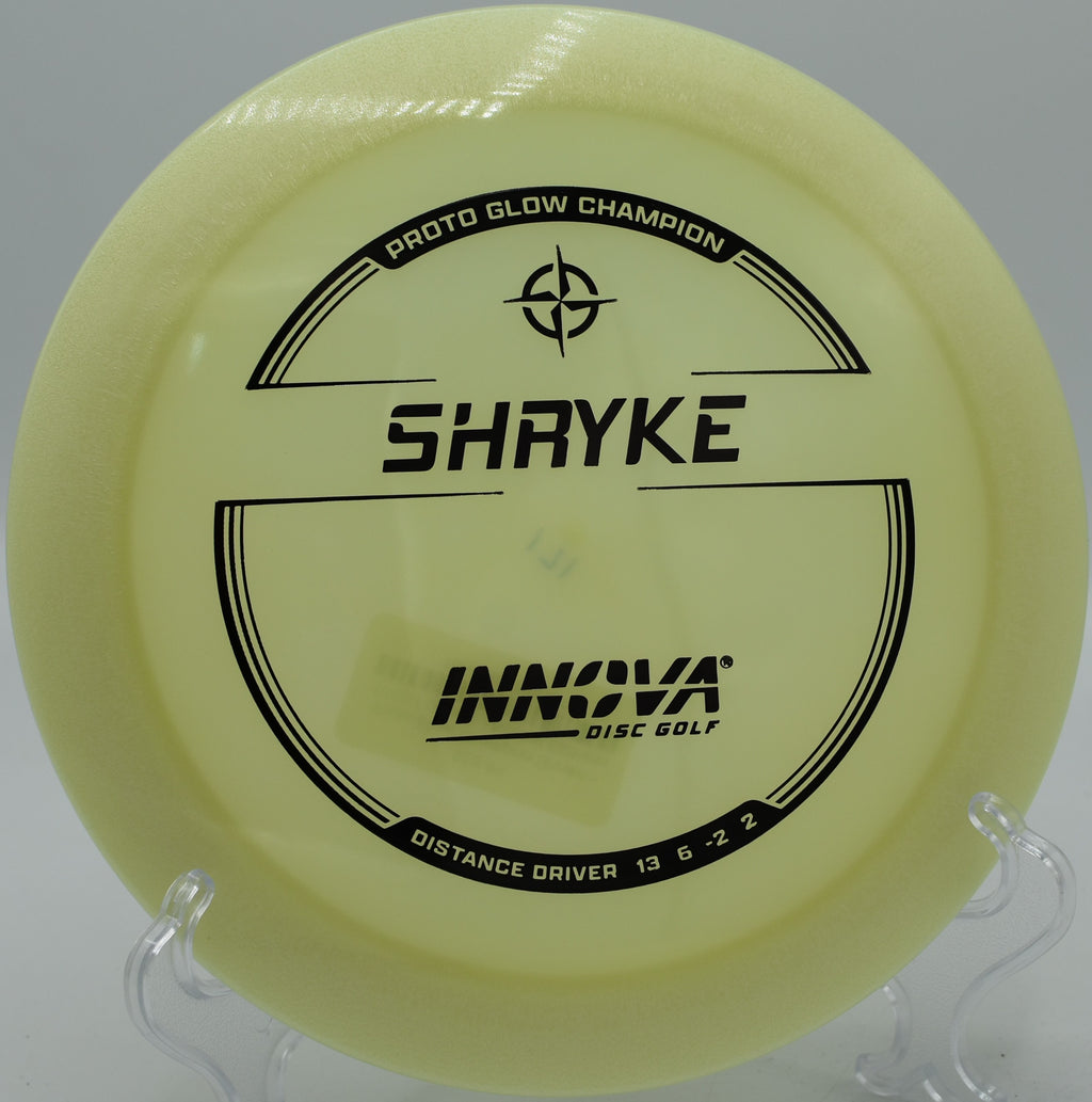 An Innova Proto Glow Shryke flipping up and holding a smooth flex line at Trophy Club Disc Golf Course in Trophy Club, Texas.