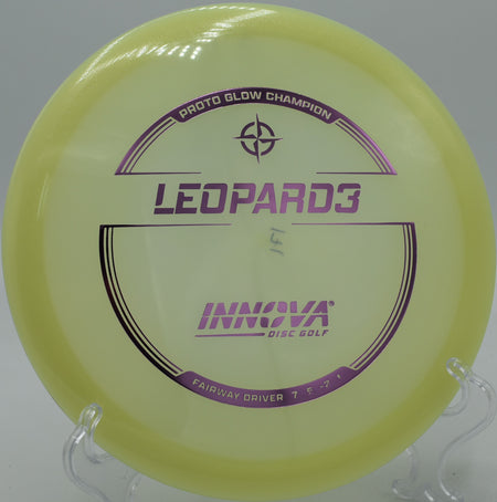 A disc golfer throwing a precise turnover shot with a Proto Glow Leopard3 at Pine Cone Crush Disc Golf Course in Sartell, Minnesota.