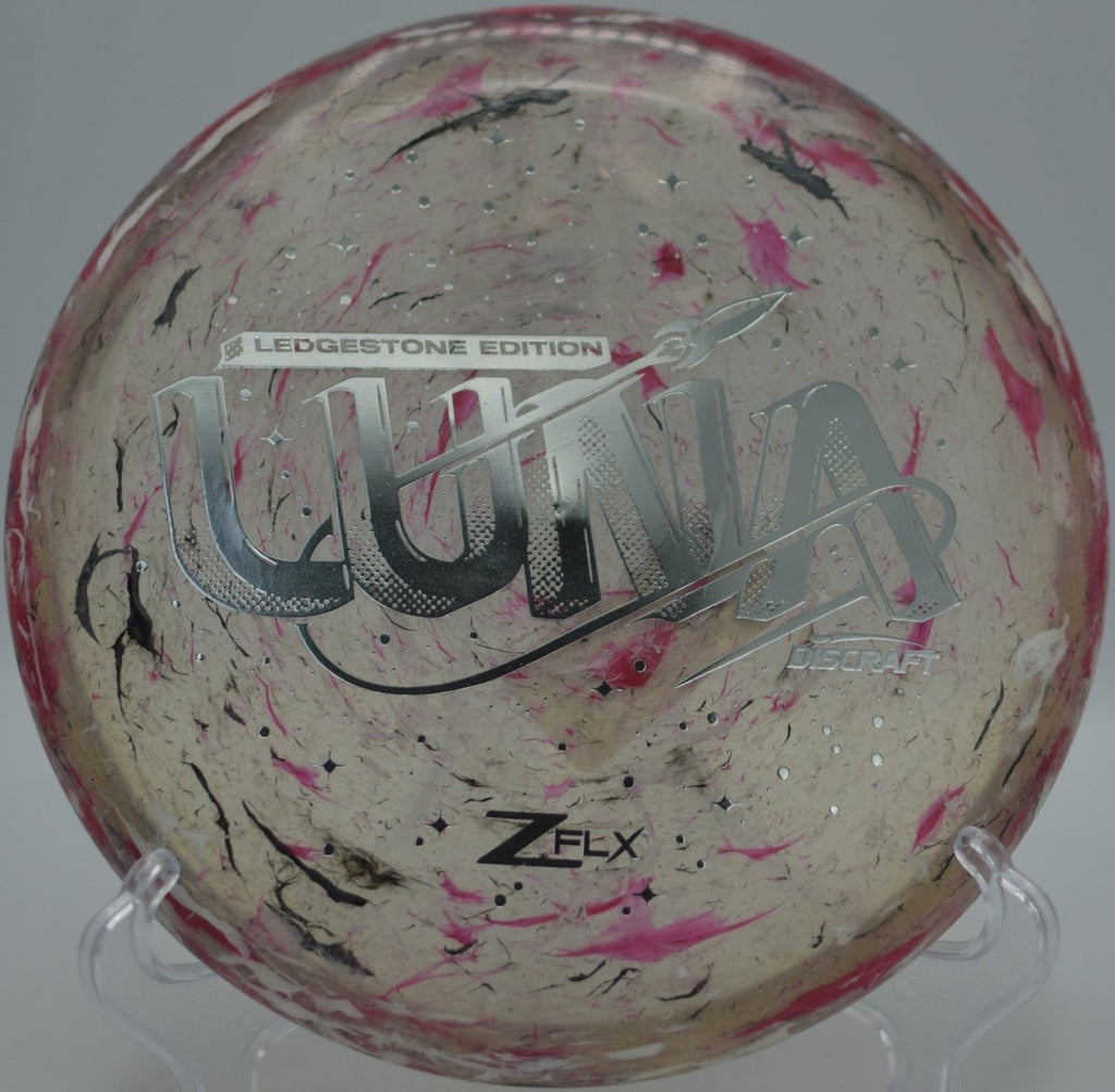 Close-up of Jawbreaker Z Super Flx Luna highlighting soft flexible rim at Idlewild Disc Golf Course in Burlington, Kentucky