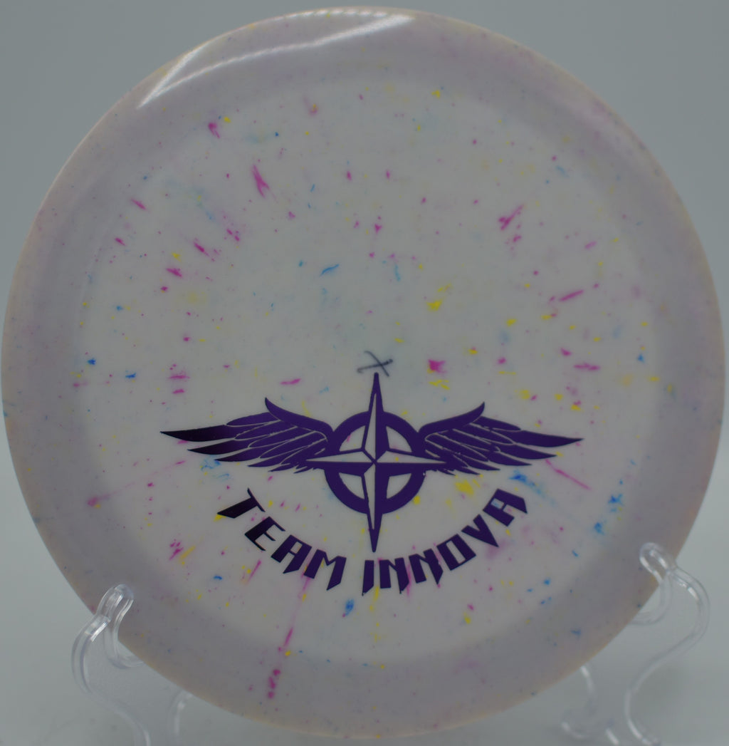 Innova Steve Brinster Team Stamp Splatter Star Destroyer stable distance driver launching long hyzers at Maple Hill Disc Golf Course in Leicester, Massachusetts.