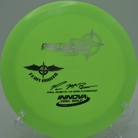 Innova 4X Paul McBeth Destroyer penned Team Stamp distance driver launching full-power backhands at Fountain Hills Disc Golf Course in Fountain Hills, Arizona.