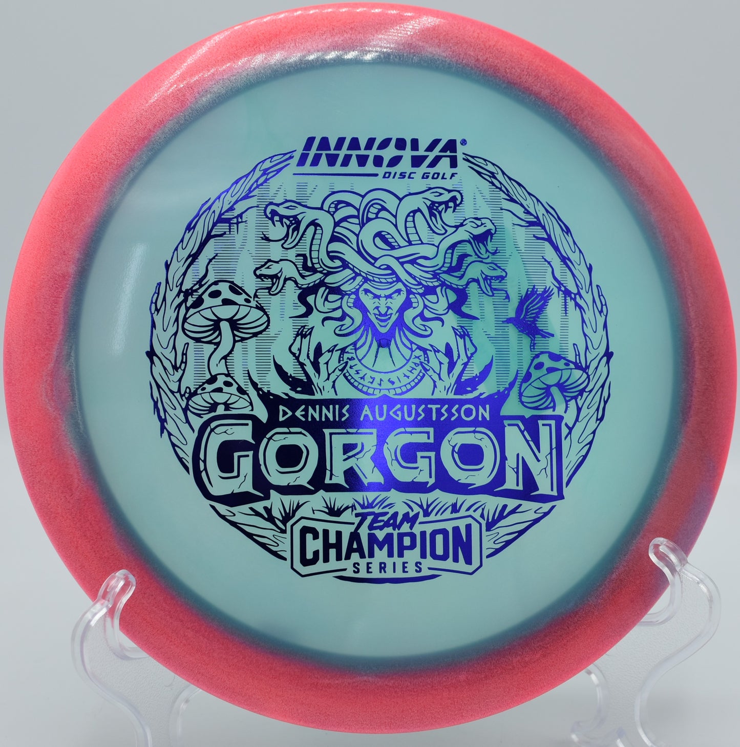 Innova Halo Gorgon resting near the basket after a controlled fairway shot at Tyler State Park in Newtown, Pennsylvania

